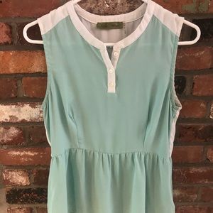 Green and White Sleeveless Blouse